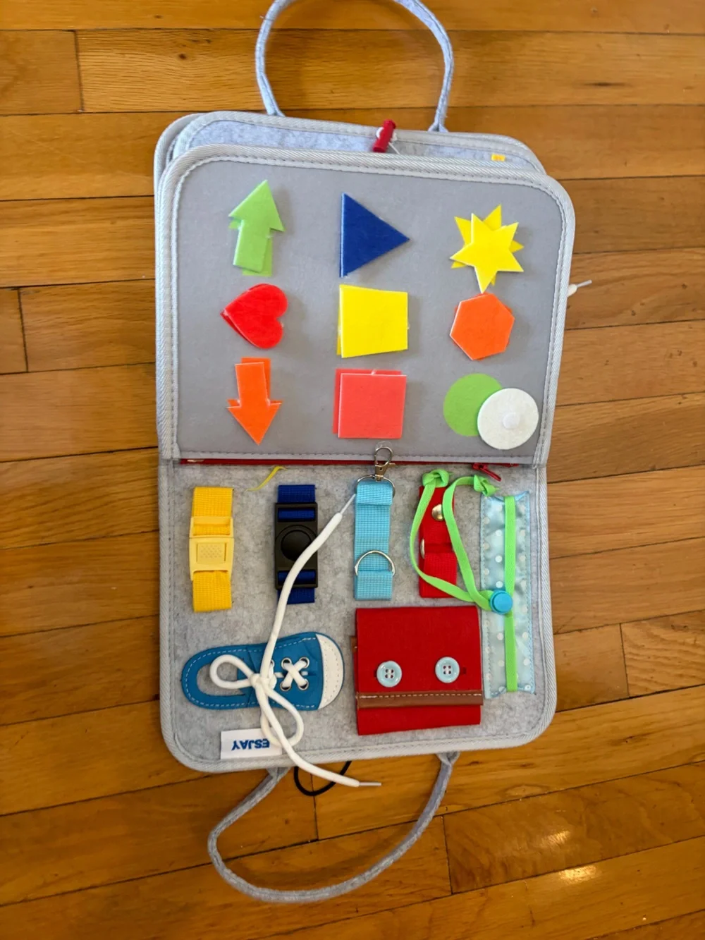 Kids Montessori Busy Board with Colorful Dinosaurs